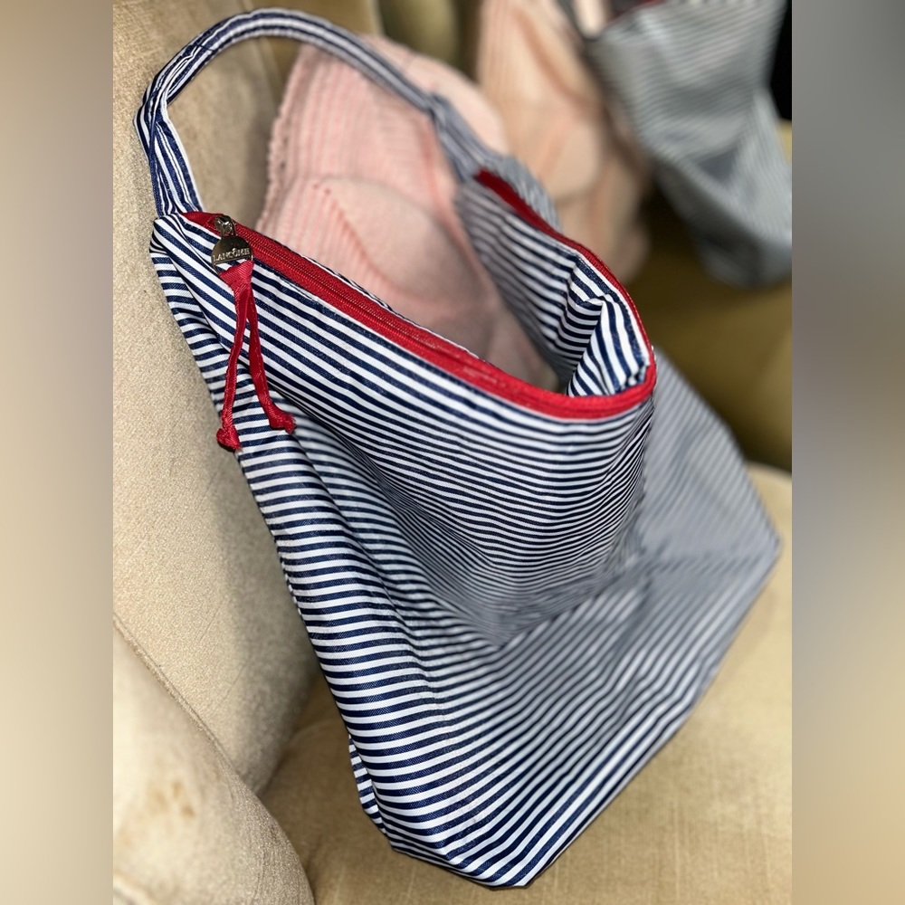Lancôme blue, red and white striped bag w/ zipper